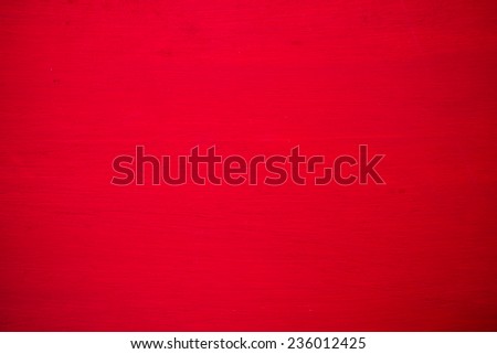 Wood board painted red for background.