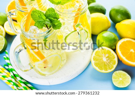 Infused water with fresh citrus fruits and ice.