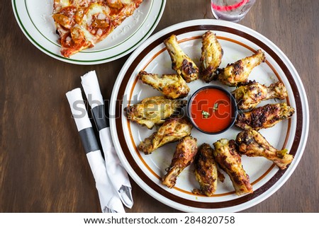 Appetizer plate with wood fired oven chicken wings.