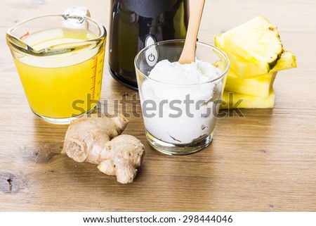 Freshly made pineapple ginger smoothie with Greek yogurt and juice.
