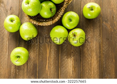 Organic Granny Smith apples on the table.