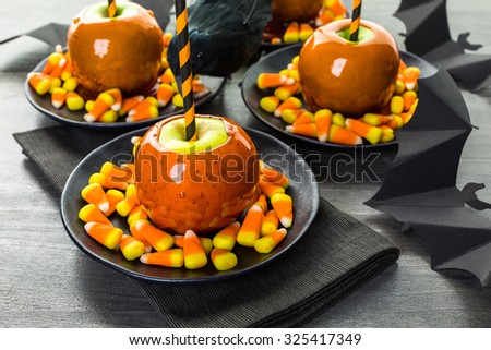 Handmade orange candy apples for Halloween.