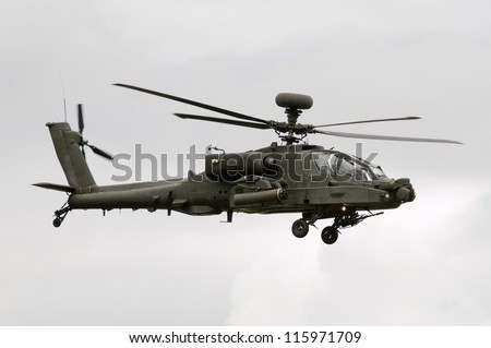 ROYAL INTERNATIONAL AIR TATTOO, FAIRFORD, UK - JULY 08: British Army AgustaWestland Apache attack helicopter performing display at the Royal International Air Tattoo, RAF Fairford, July 08, 2012.