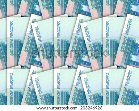 Abstract background of money pile 1000 russian rouble bills. Studio photography.