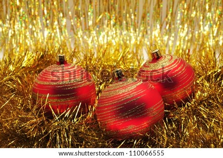 Beautiful purple Christmas ornaments and Christmas gold chain