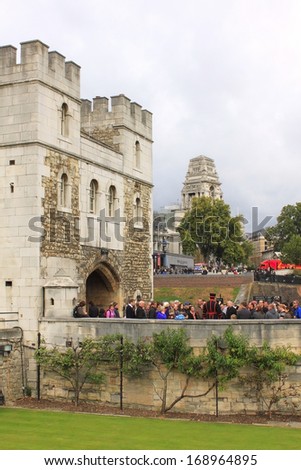 London - CIRCA OCTOBER 2011: Her Majesty\'s Royal Palace and Fortress, Tower of London. People on excursions in the historic castle on the north bank of the River Thames in central London