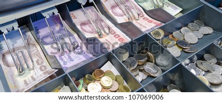 Cash drawer with thai currency inside