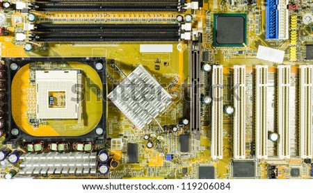 closeup of modern motherboard without CPU and RAM