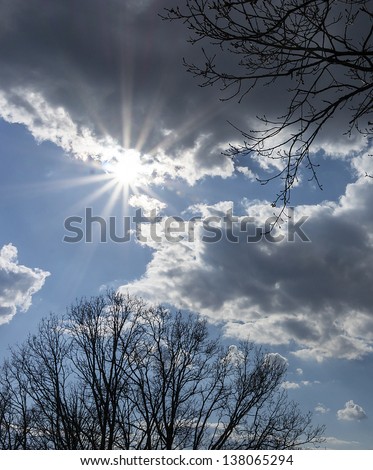 dark sky with sun light coming through the cloud  and sun beam