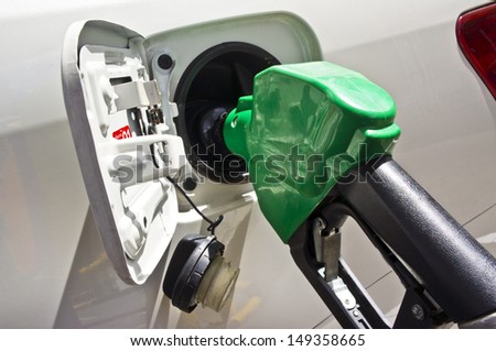 fill up fuel at gas station self service