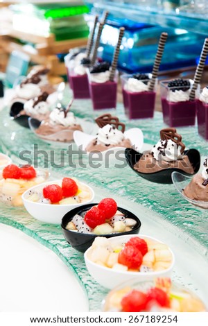 Mixed Fruits Salad and Fancy cake in buffet line decor