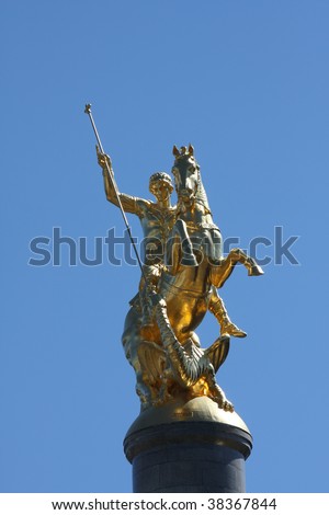 Golden statue of Saint George, patron saint of the republic of Georgia in the central square in Tbilisi