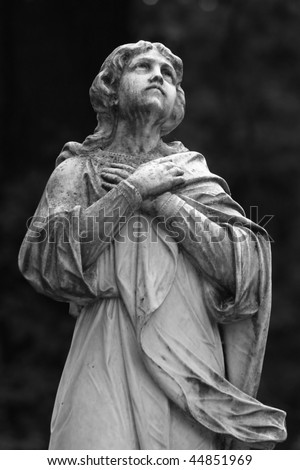 stock photo Statue on a gravestone in Lviv's cemetery Ukraine end 19th