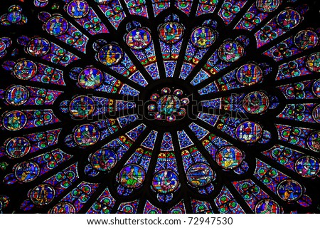 South rosette stained glass window in the Cathedral of Notre Dame in Paris, created in 1260. This window is one of the most famous in the world.