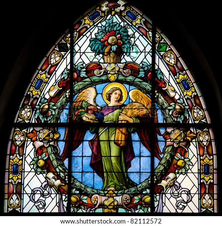 N'oublions pas nos chers Anges Gardiens! - Page 19 Stock-photo-stained-glass-window-depicting-an-angel-this-window-is-located-in-saint-james-s-church-swedish-82112572