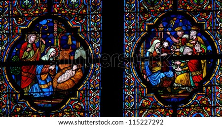 DINANT - OCTOBER 19: Stained glass window depicting Nativity Scene on Christmas and the Visit of the Three Magi in the cathedral of Dinant, Belgium, on October 19, 2011.