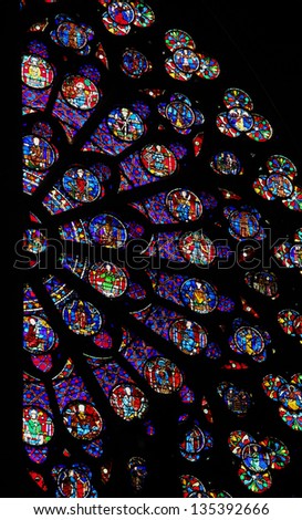 PARIS -  MARCH 4: Famous rose window in the cathedral of Notre Dame in Paris, France on March 4, 2011.