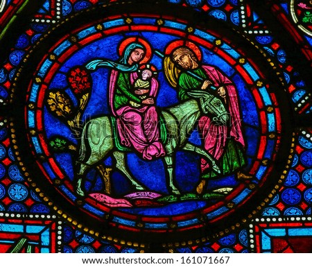 CAEN, FRANCE - FEBRUARY 12:  Stained glass window depicting Joseph, Mother Mary and Jesus in the cathedral of Caen, France, on February 12, 2013.