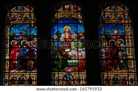 MALAGA, SPAIN - NOV 29: Stained glass window depicting the Last Supper, in the cathedral of Malaga, Spain, on November 29, 2013.