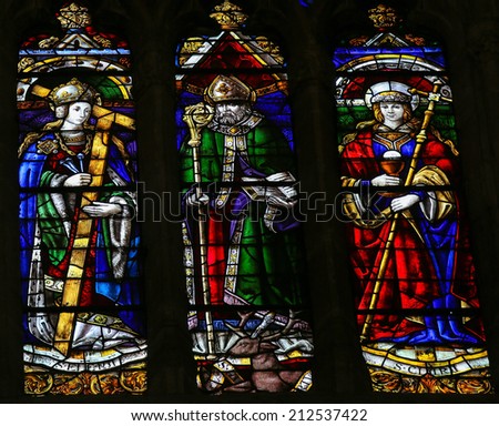 OVIEDO, SPAIN - JULY 17, 2014:  Stained glass window depicting Saint Clara and Saint Helena in the cathedral of San Salvador in Oviedo, Asturias, Spain.