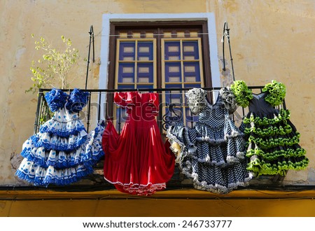 Traditional flamenco dresses at a house in Malaga, Andalusia, Spain.