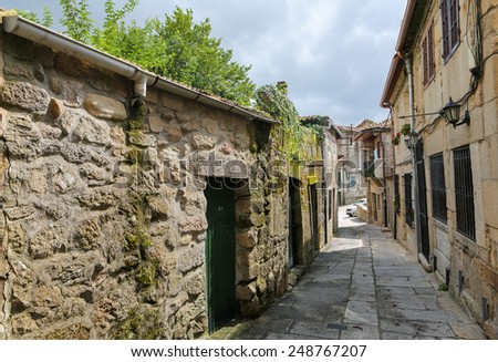 Narrow street in the old center of Tui, a border town with Portugal in the region of Galicia, Spain.