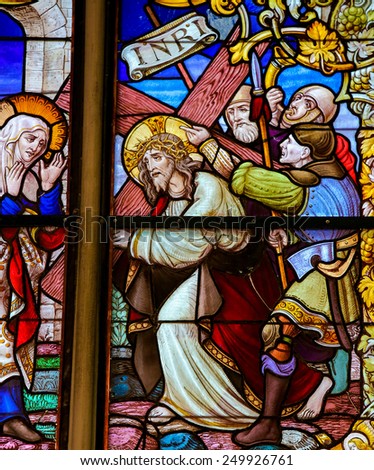 MECHELEN, BELGIUM - JANUARY 31, 2015: Stained Glass window depicting Jesus and Mary on the Via Dolorosa, in the Cathedral of Saint Rumboldt in Mechelen, Belgium.