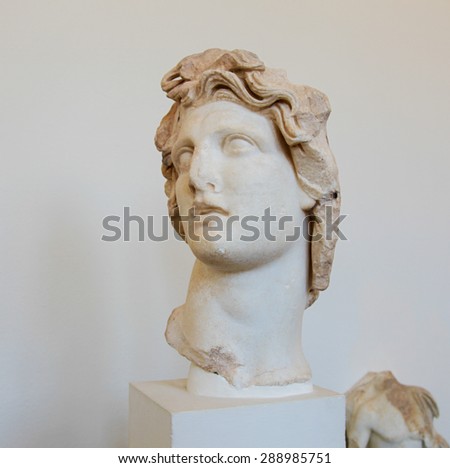RHODES, GREECE - JUNE 12, 2015: Statue of Apollo, Greek God of the Sun, in the Archeological Museum of Rhodes, Greece