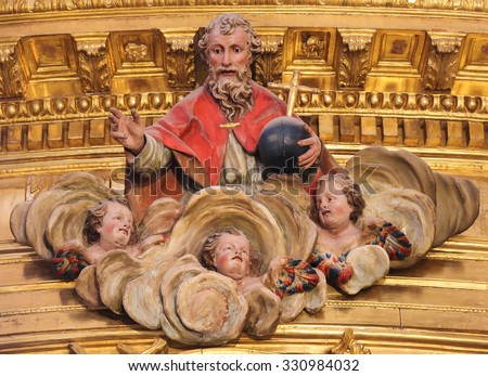 BURGOS, SPAIN - AUGUST 13, 2014: Polychrome sculpture of God and Three Angels in Heaven, in the Cathedral of Burgos, Castille, Spain