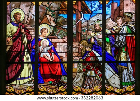 TOURS, FRANCE - AUGUST 14, 2014:  Stained glass window depicting the Epiphany, the Visit of the Three Kings in Bethlehem, in the Cathedral of Tours, France.