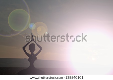Sunrise meditation in a yoga position