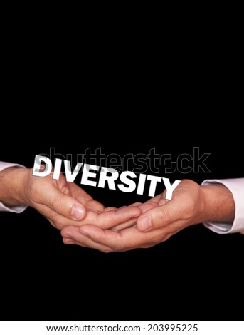 Hands holding the word Diversity