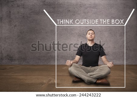 Casual business man thinking outside the box. Meditation