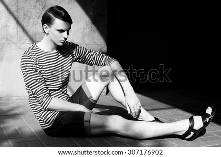sitting man - black and white portrait