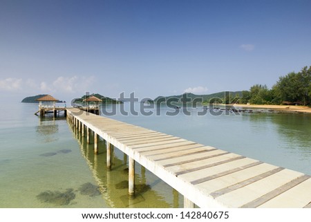 concrete pier in cave and blue sky of koh mark and beautiful, sea of trad district  in thailand