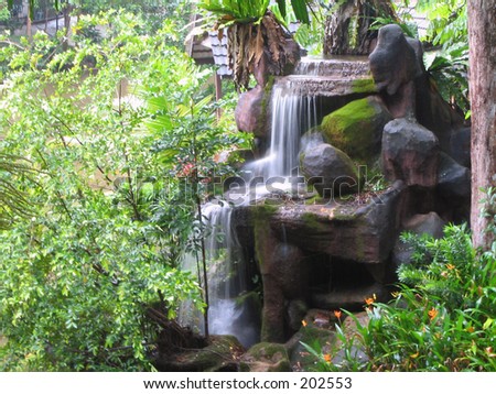 This is human made waterfall in Malacca, Malaysia. This waterfall is located in Malacca well-known forest, called \