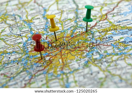 push pins on a tourist map- London, England