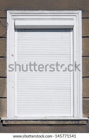 white window with roller shutter