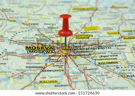 red push pin pointing at Moscow, Russia