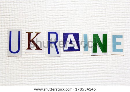 word Ukraine on white handmade paper texture