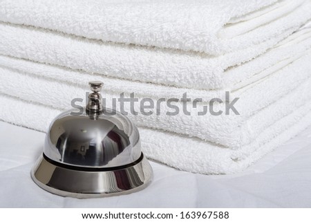 Room service bell and towels