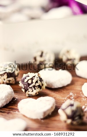 Chocolate almond candies and vanilla cookies