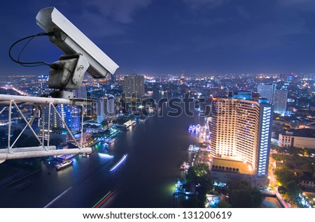 Security camera detects the movement of traffic. Skyscraper rooftop.