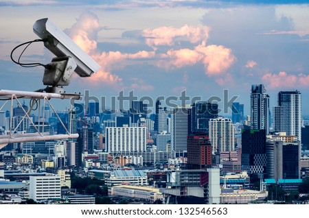 Security camera detects the movement of traffic. Skyscraper rooftop.