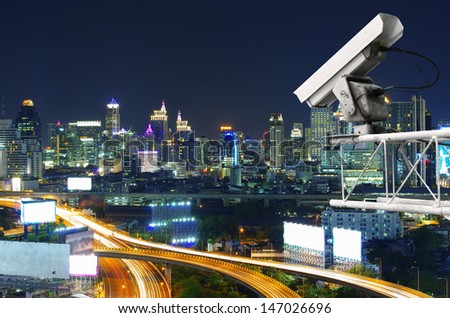 Security camera detects the movement of traffic. Skyscraper rooftop.