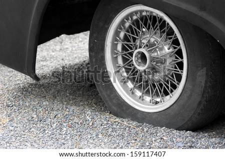 Close up of a old wheel tire, old classic cars.