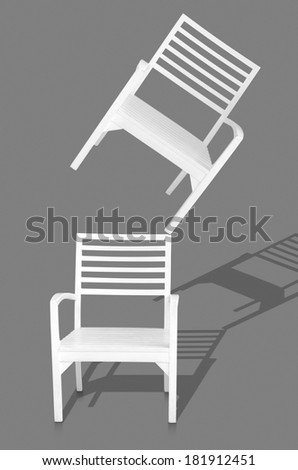 White chair isolated on gray background with clipping path. Concept of risk