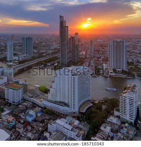 Landscape modern building near the river at sunset in Bangkok view of the bird.HDR