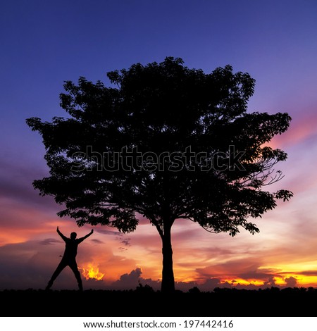 Beautiful landscape with silhouette of trees and men happy. Beautiful sunset sky