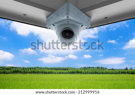 The security cameras on a balcony high building. CCTV view clear sky